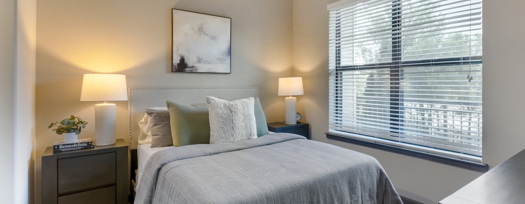 Bedroom with natural lighting and high ceilings